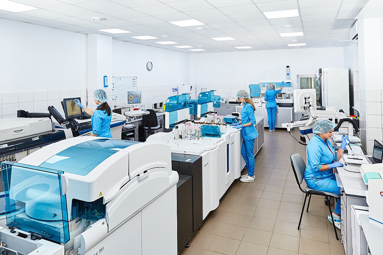 Clinical laboratory technicians analysing samples — the kind of lab sequences featured in Inside Crime Scene